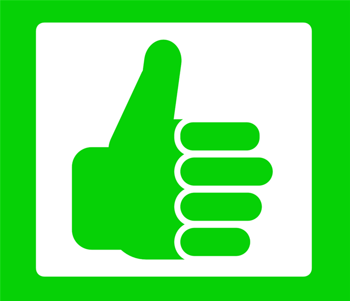 A green "thumbs up" sign