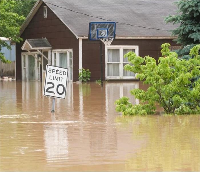 A house surrounded by floodwater